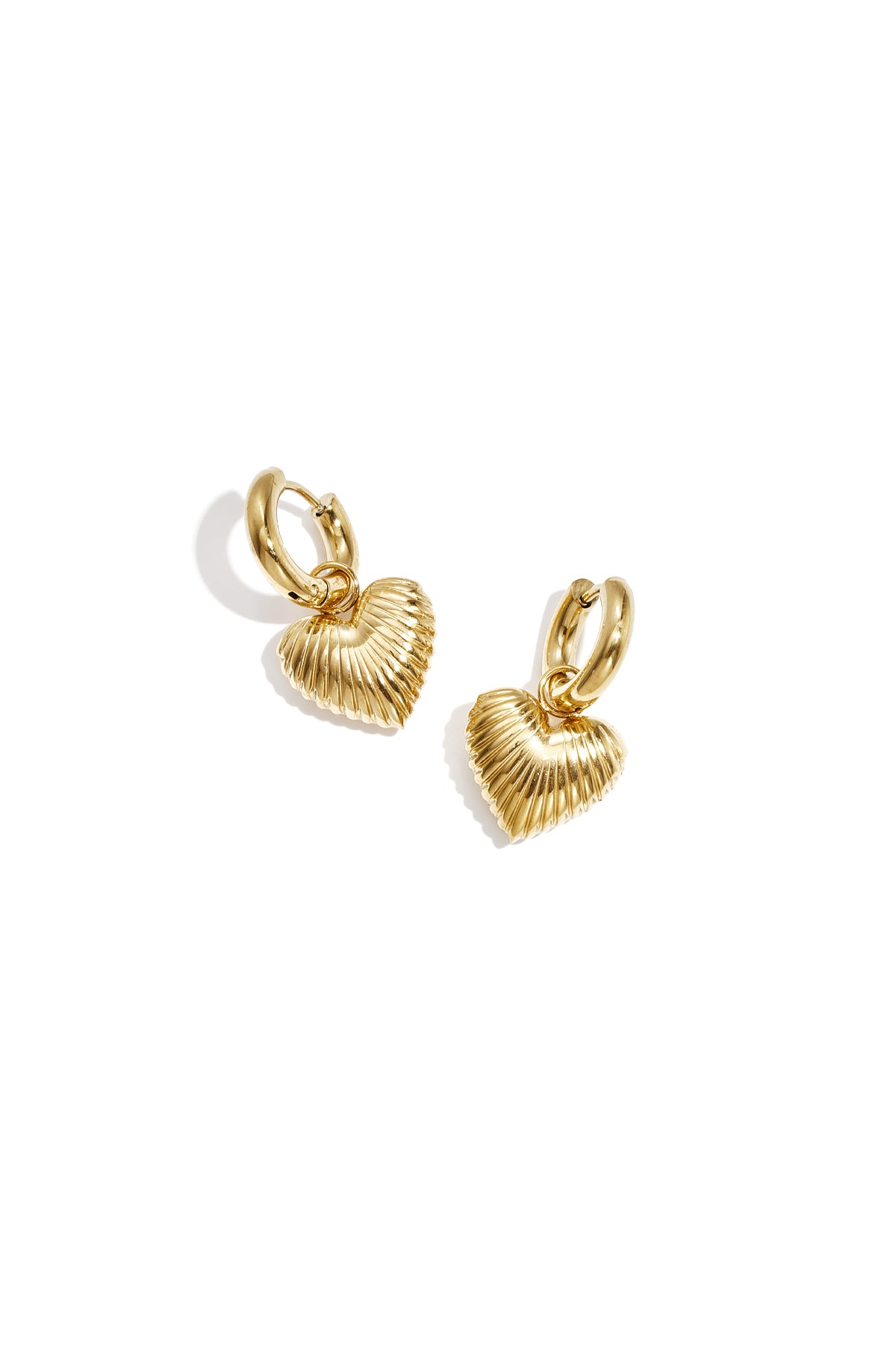 Earrings with radiant heart
